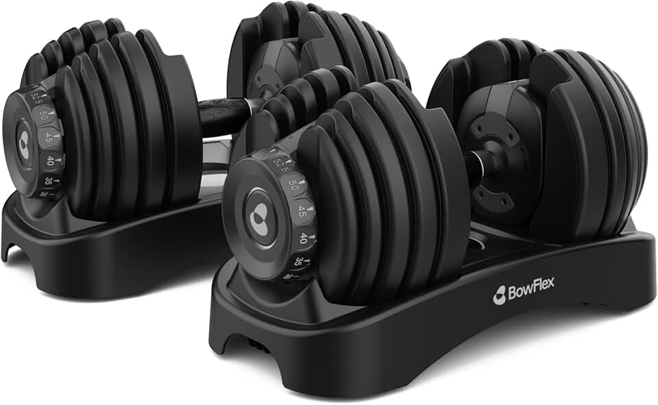 Bowflex Results Series SelectTech Dumbbells paired on a workout mat, showing dial weights