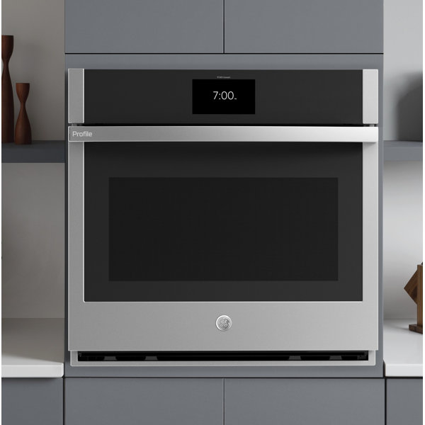 Elegant kitchen with GE Profile oven integrated into cabinetry